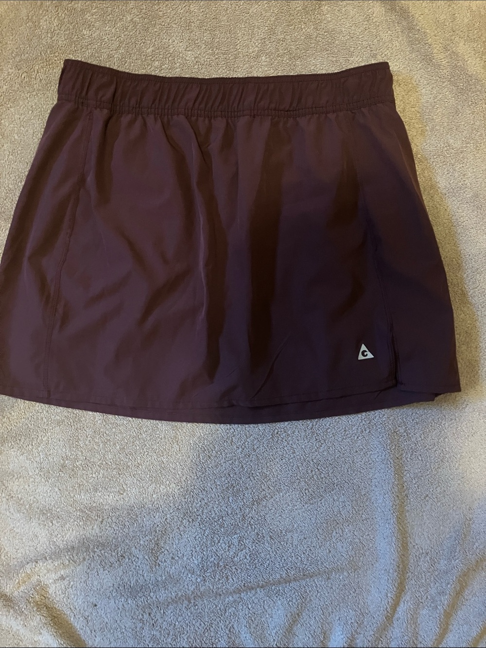 Athletic Plum Mini Skirt with Triangle Logo